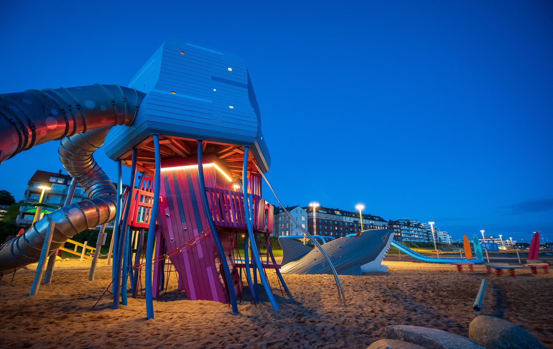 Jellyfish playground illuminated at night, MONSTRUM playgrounds