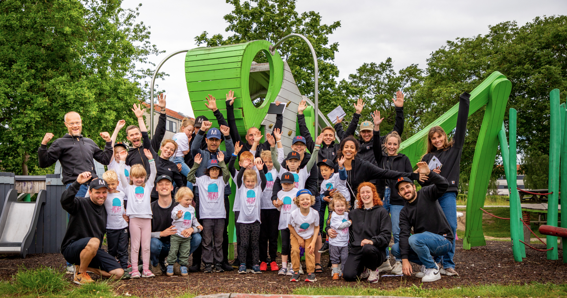 Group of kids and adults at playground