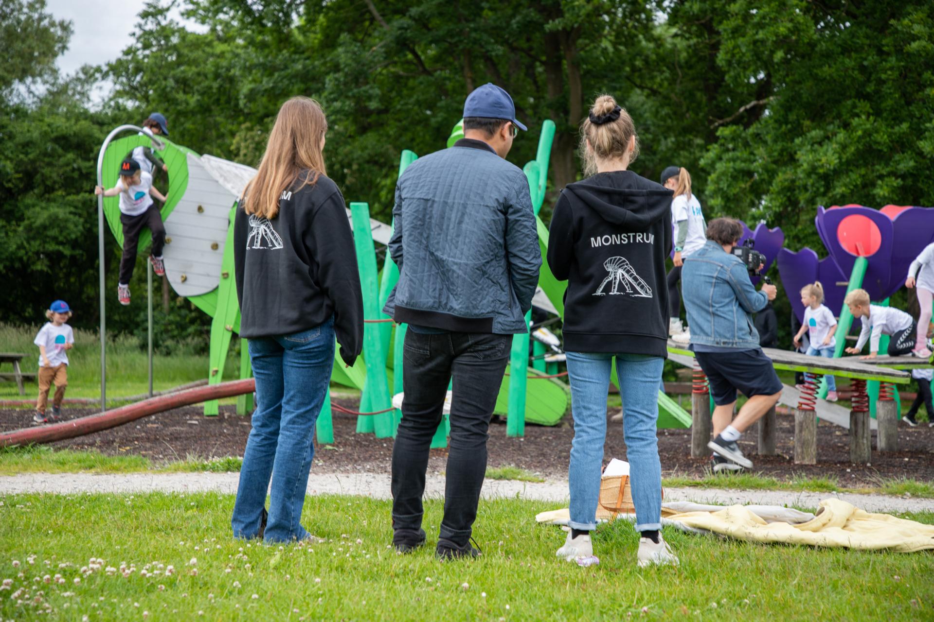 Design team inspecting playground