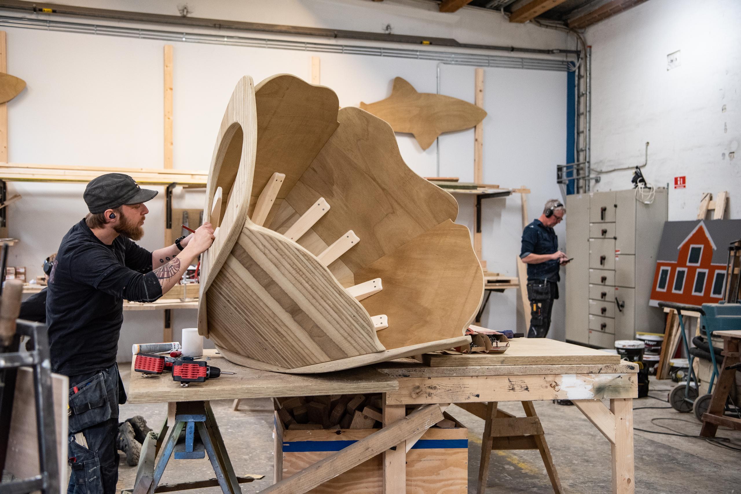Unpainted wooden play sculpture being constructed at MONSTRUM workshop