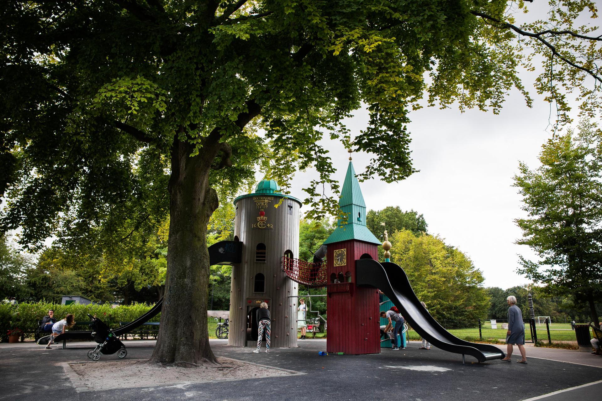 Kids and parents playing at the Tower playground