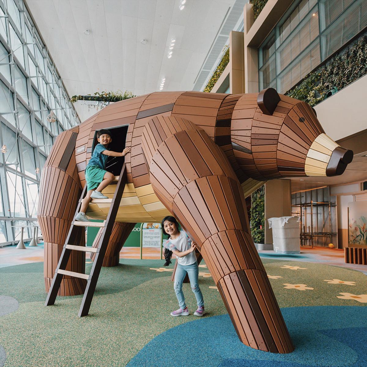 Wooden bears at Changi airport