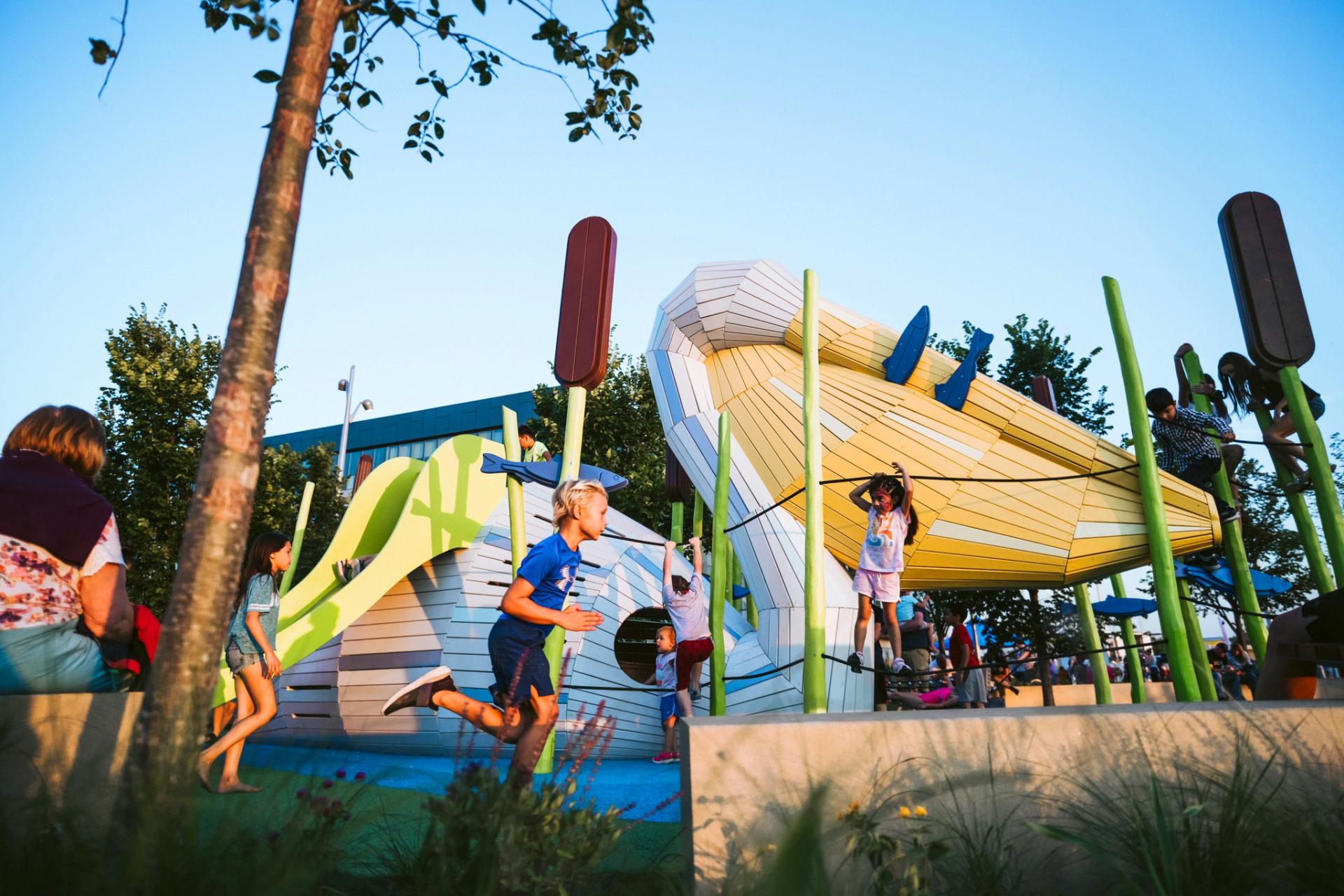 Kids running and playing at Pelican playground