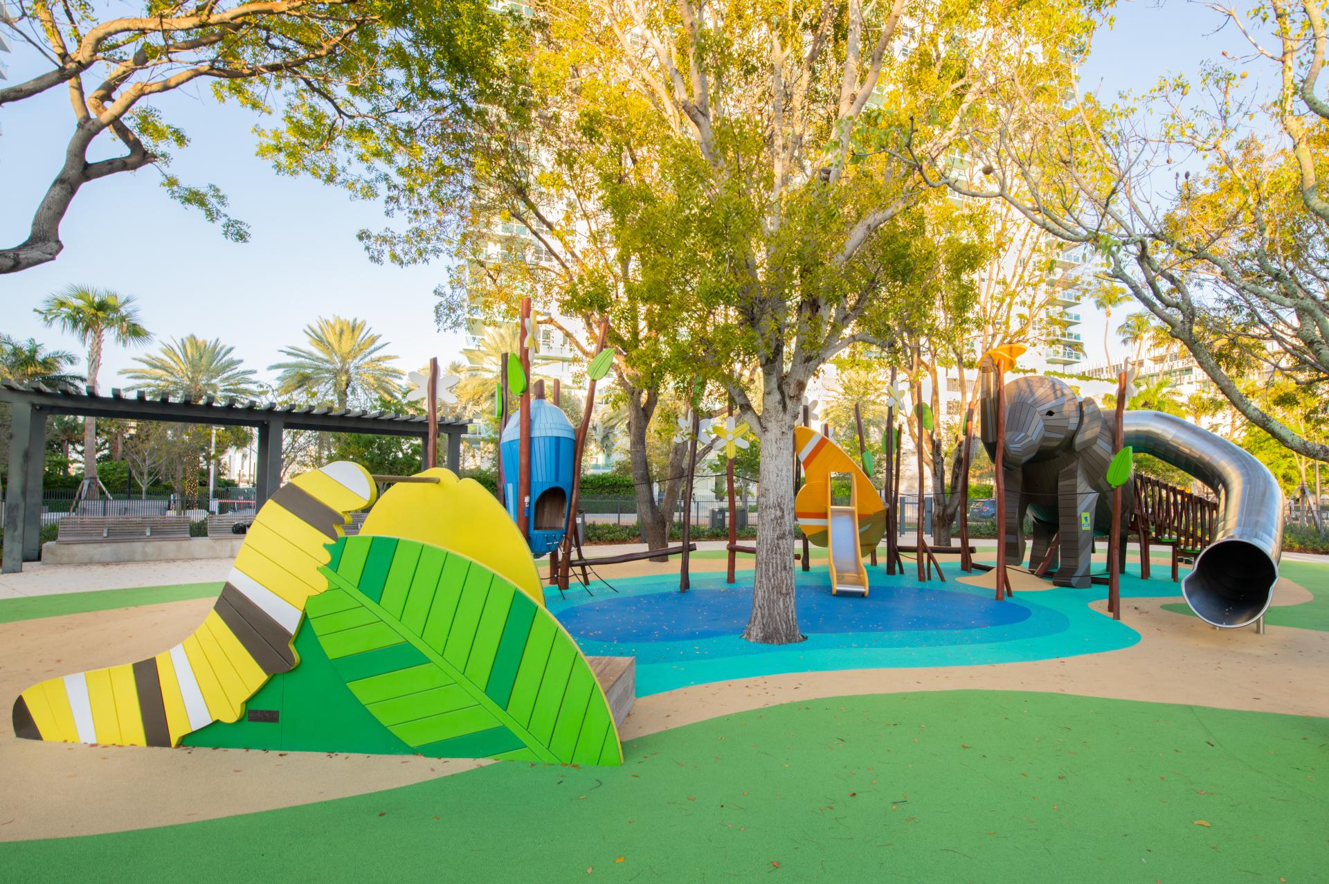 Playground with slides, an elephant and butterfly play features