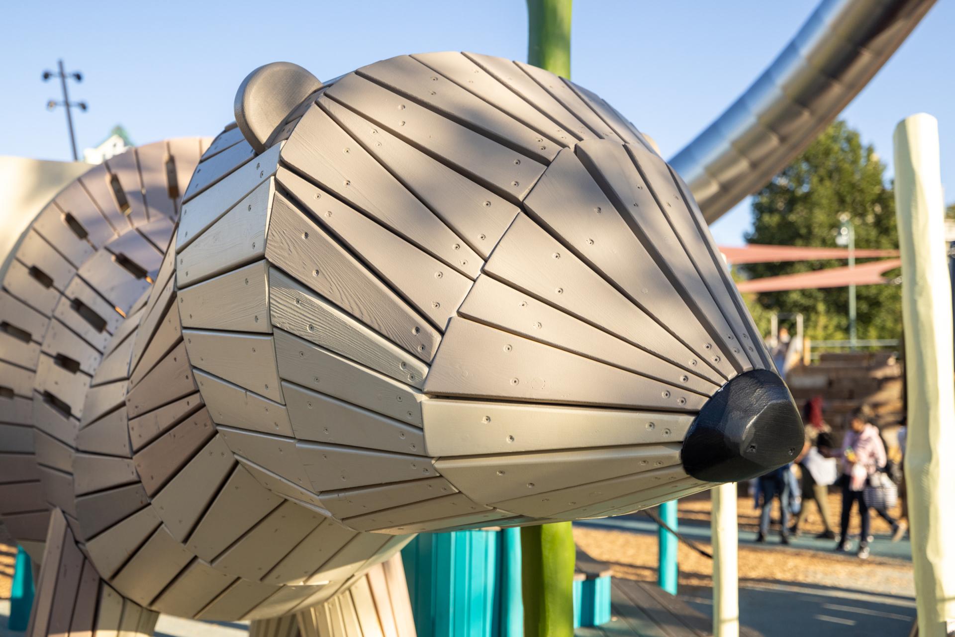 Close-up of wooden otter at playground