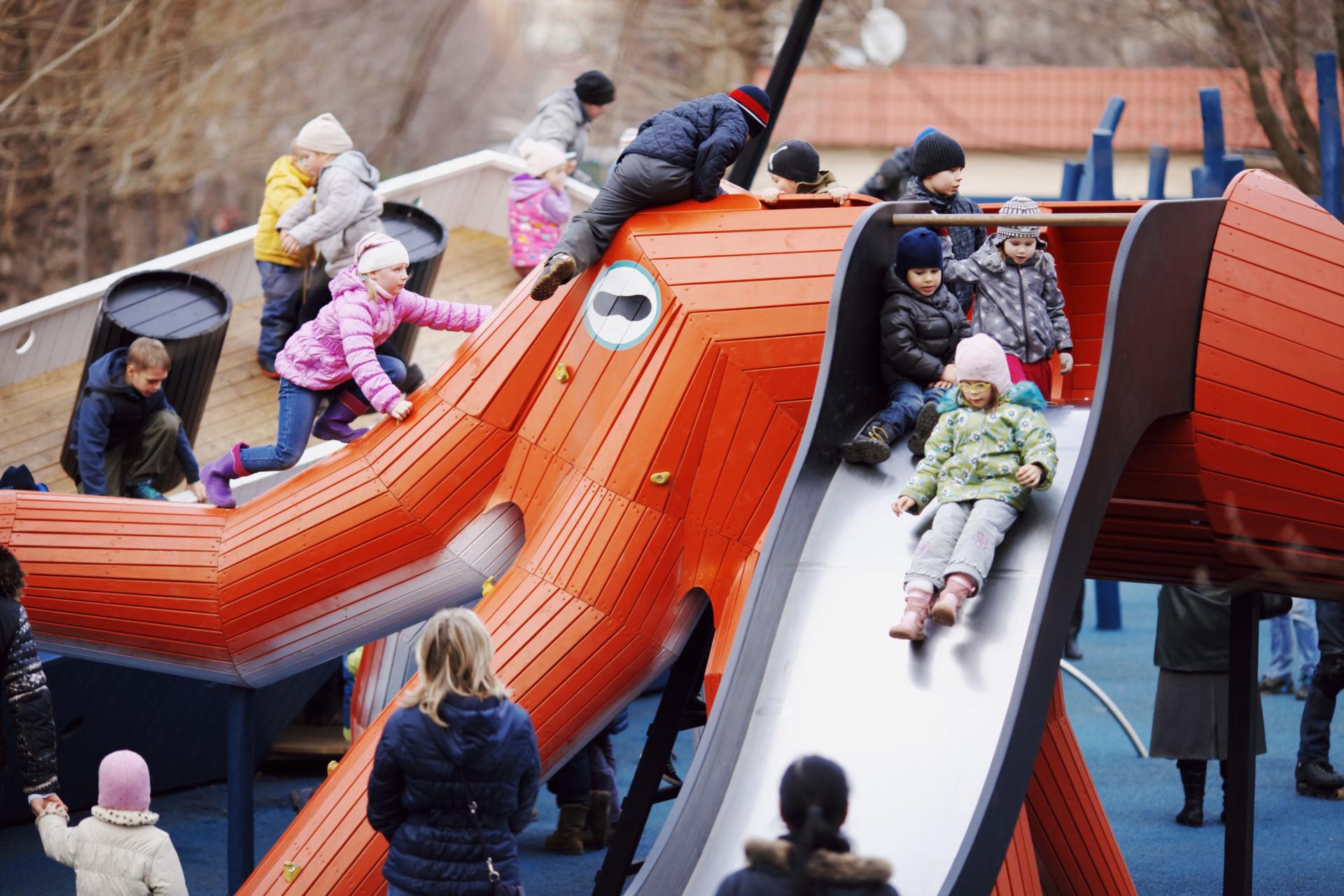 Kids playing at Gorky Park playground on giant octopus