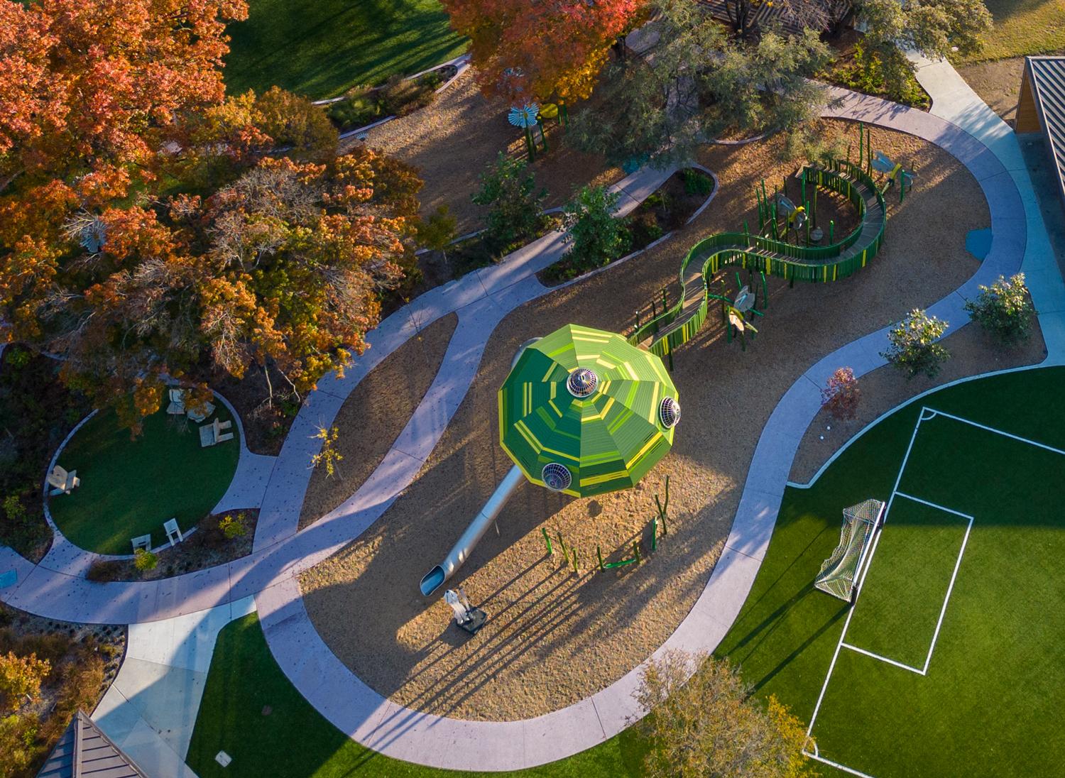 Wooden playground tree and accessible paths from above