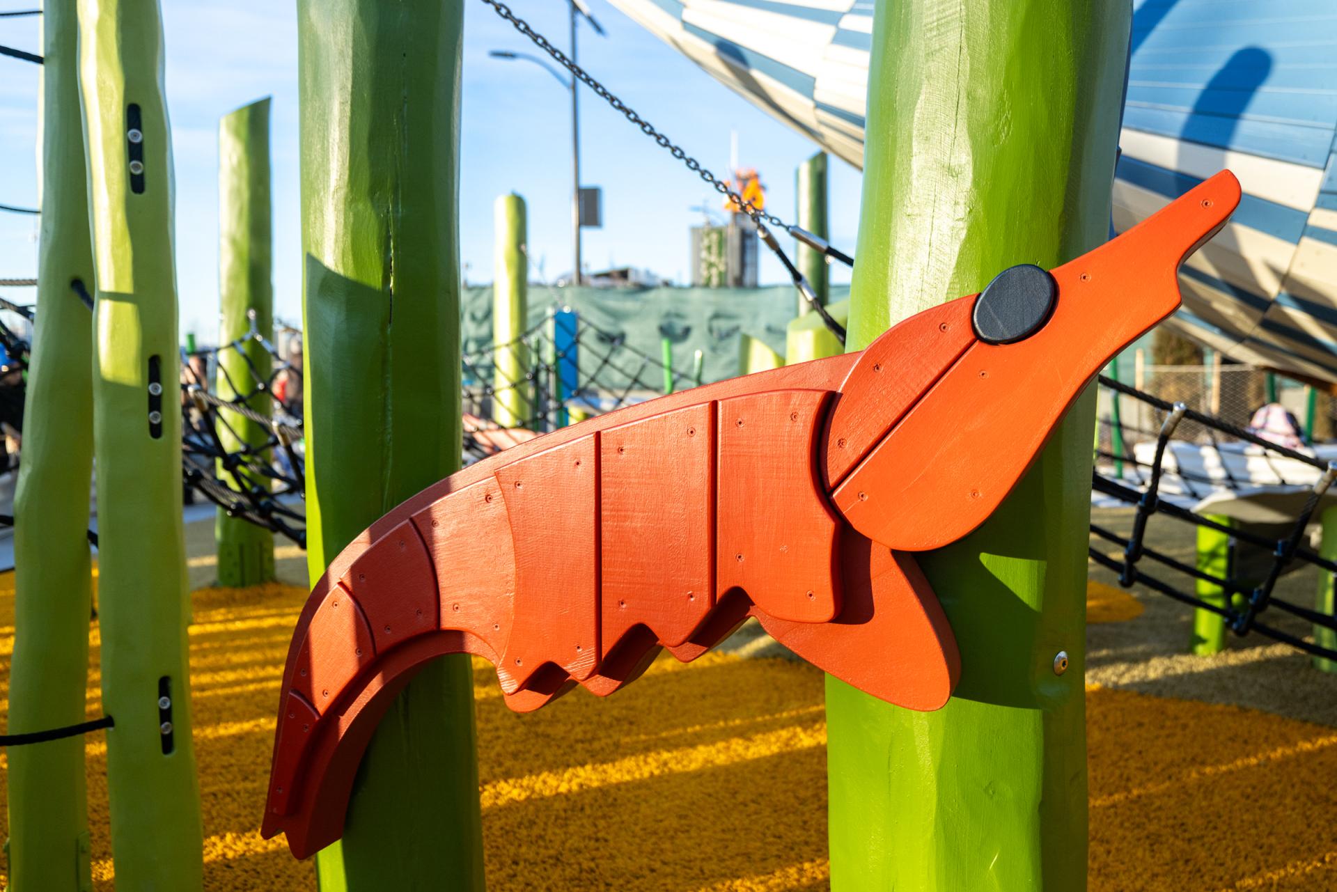 Wooden shrimp detail at marine-themed playground