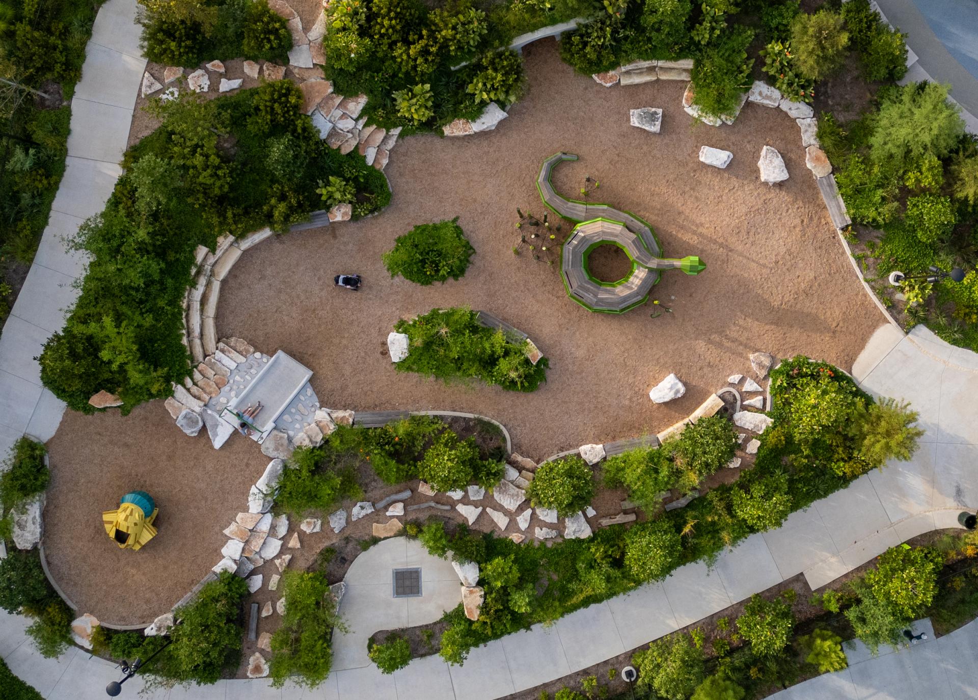 Drone shot from directly above snake and frog playground