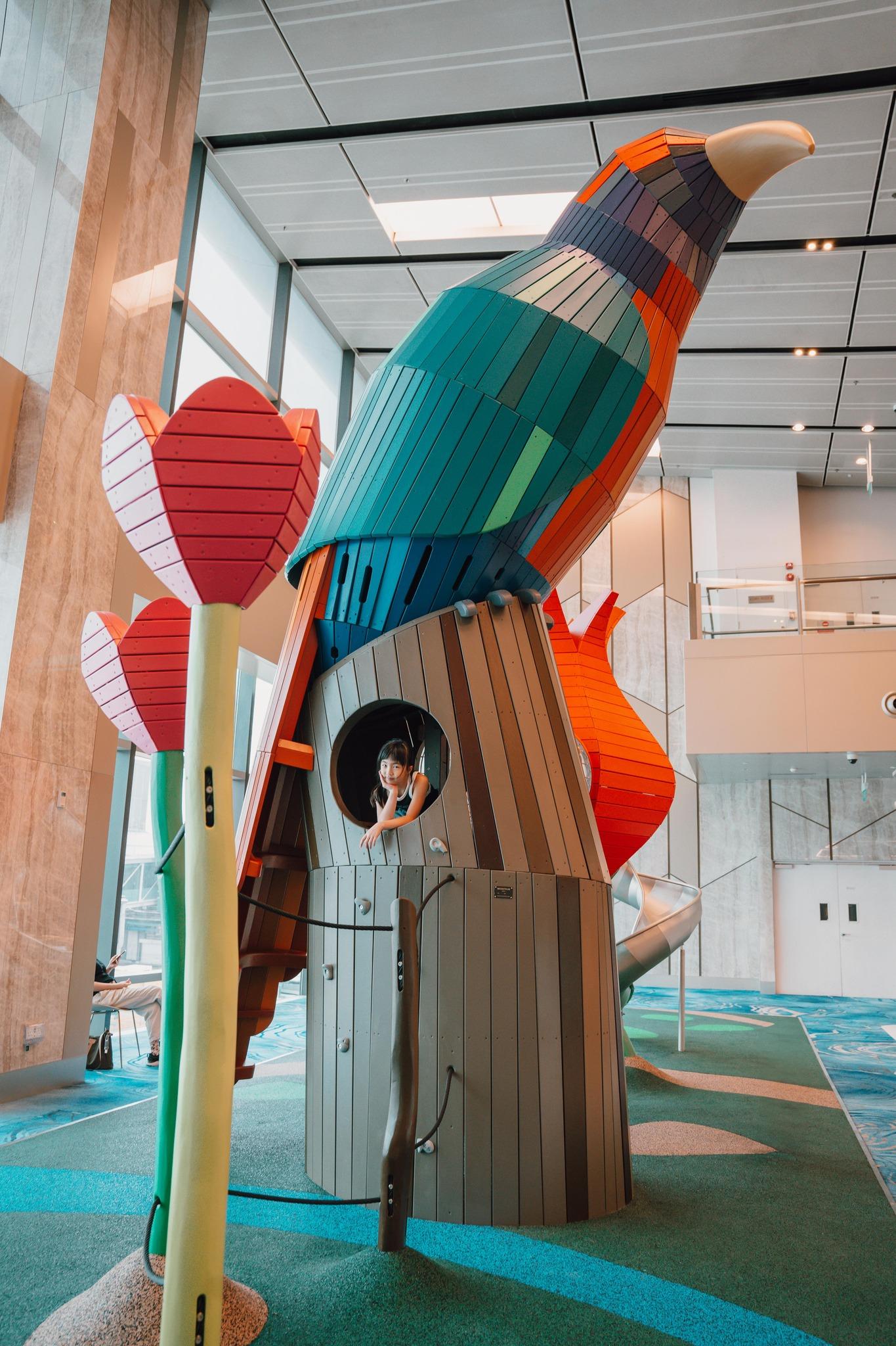 Huge wooden bird playground structure at airport
