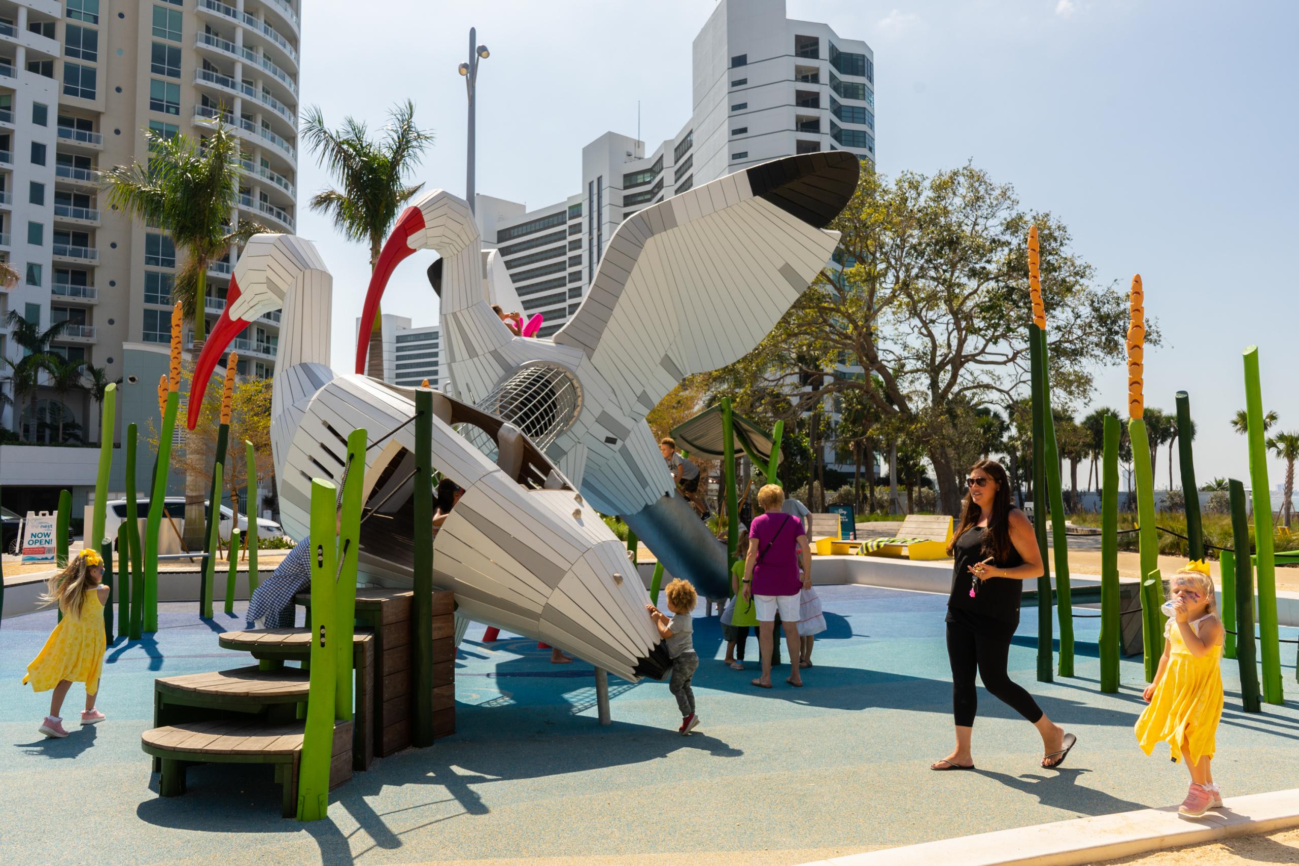 mum and kids playing at ibis bird playground