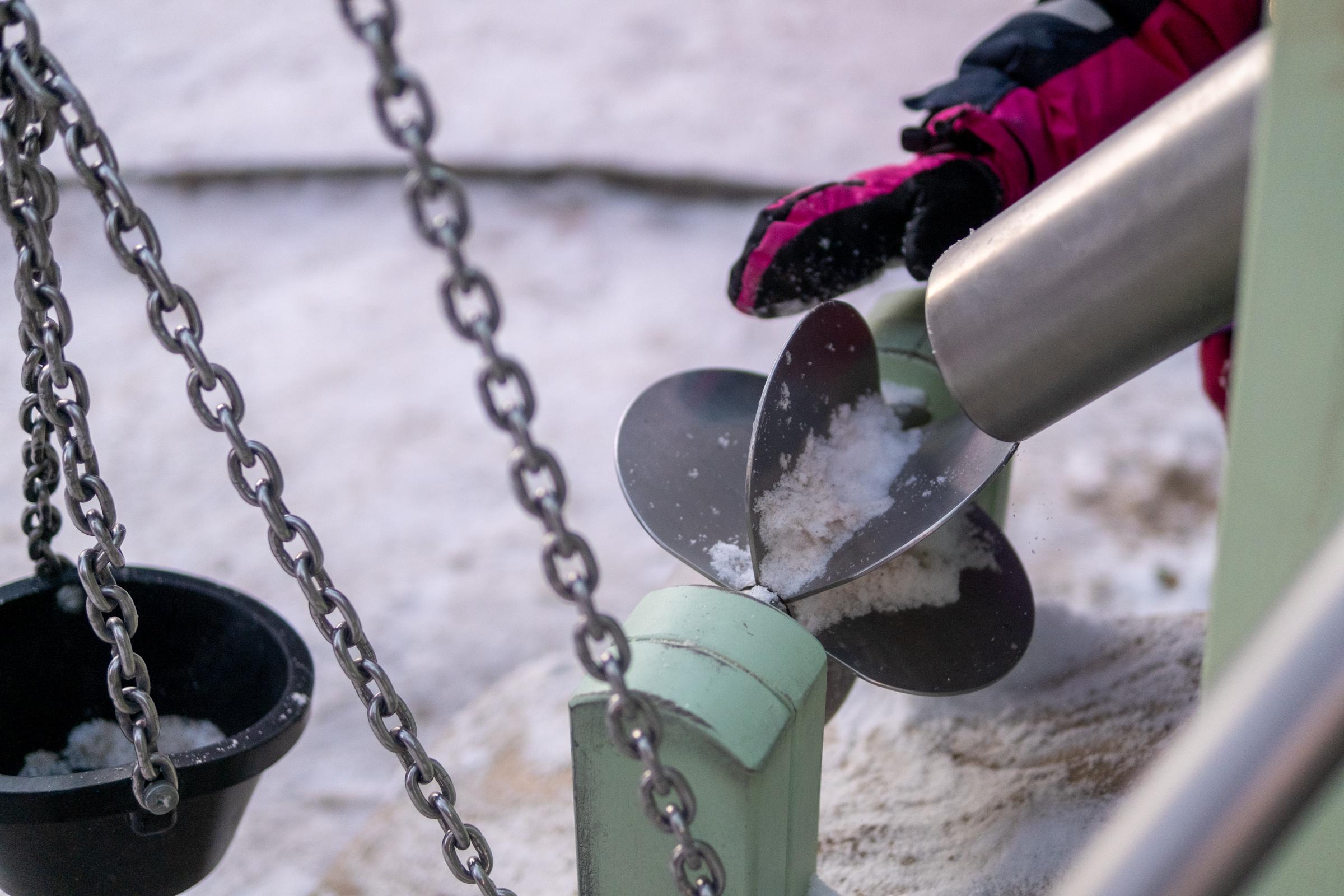 Close-up of inclusive sand play feature at playground