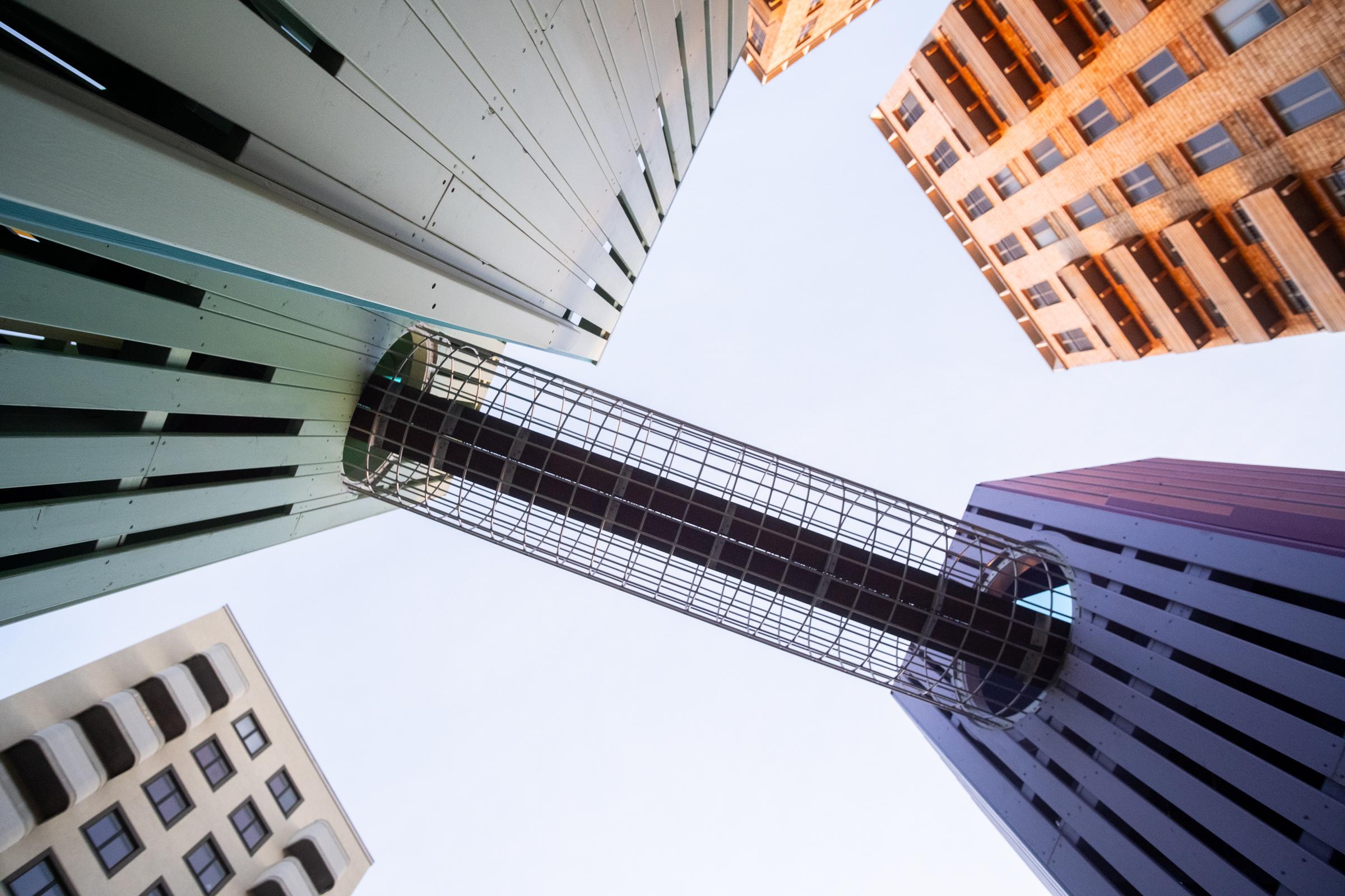 View of steel mesh playground tunnel from below