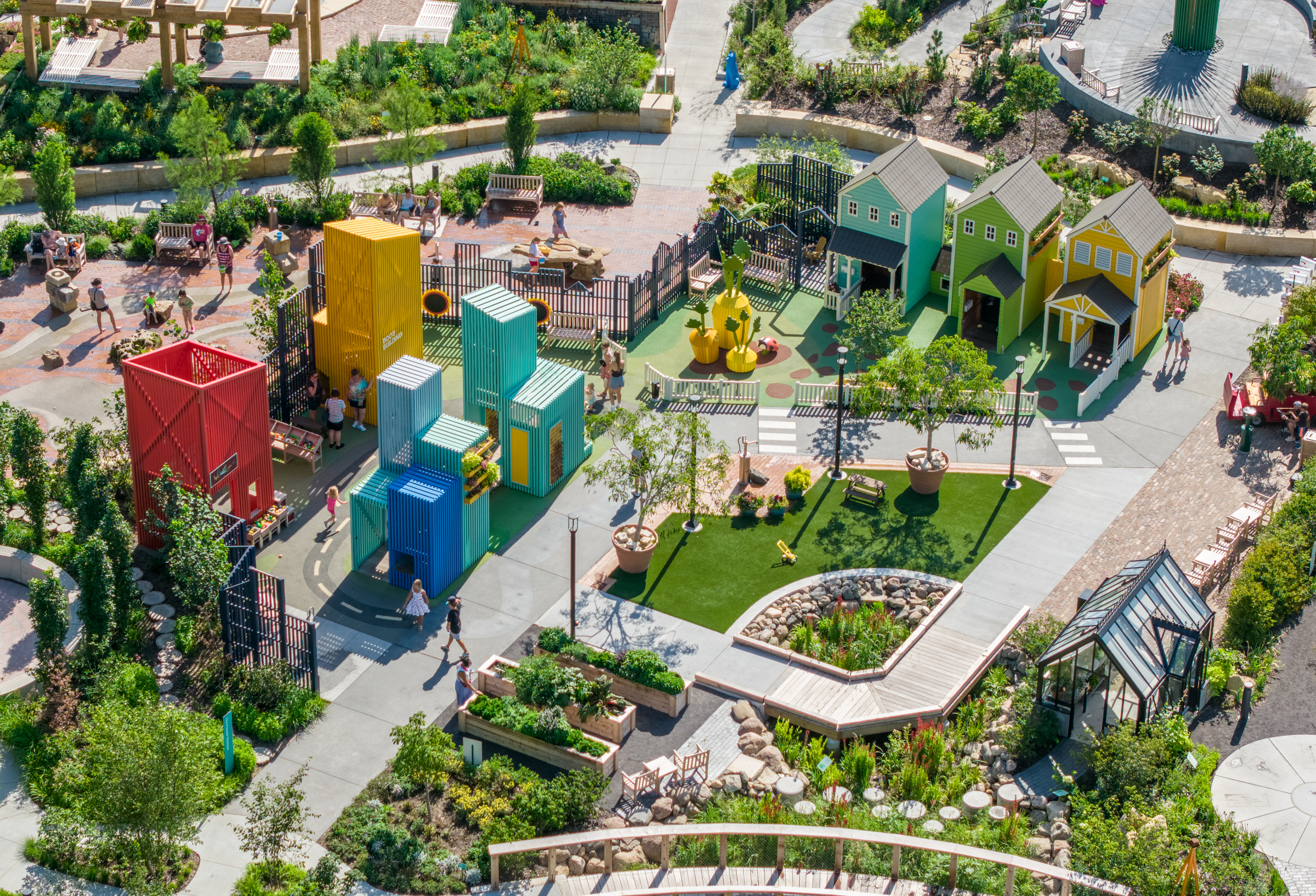 Aerial view of colourful playground neighbourhood and market square