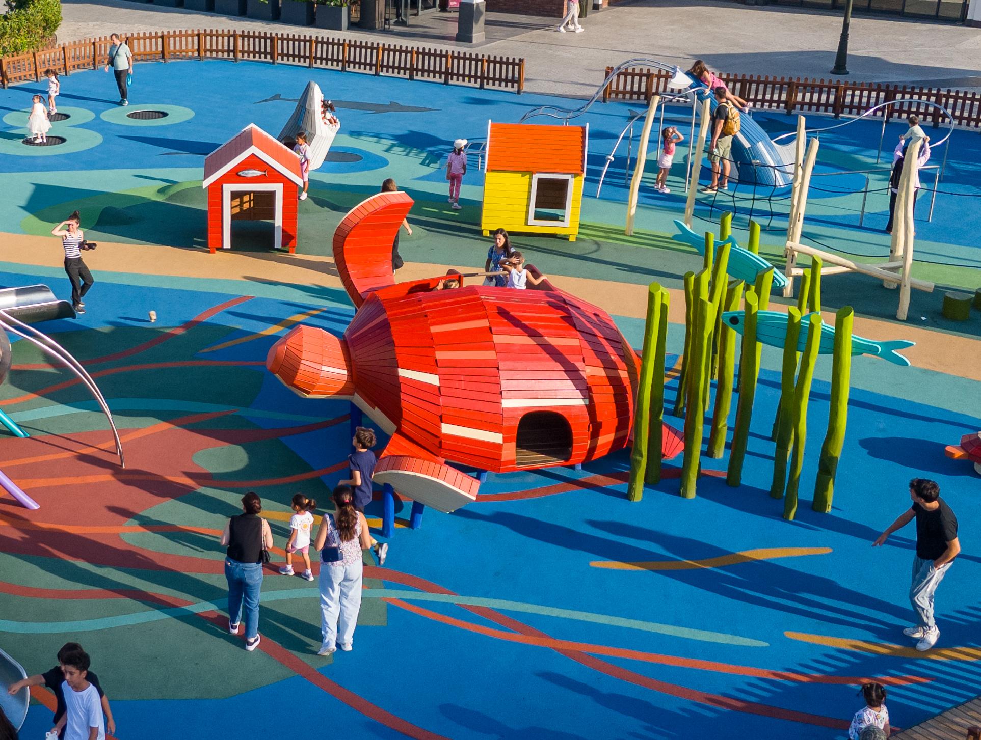Big red wooden turtle playground structure