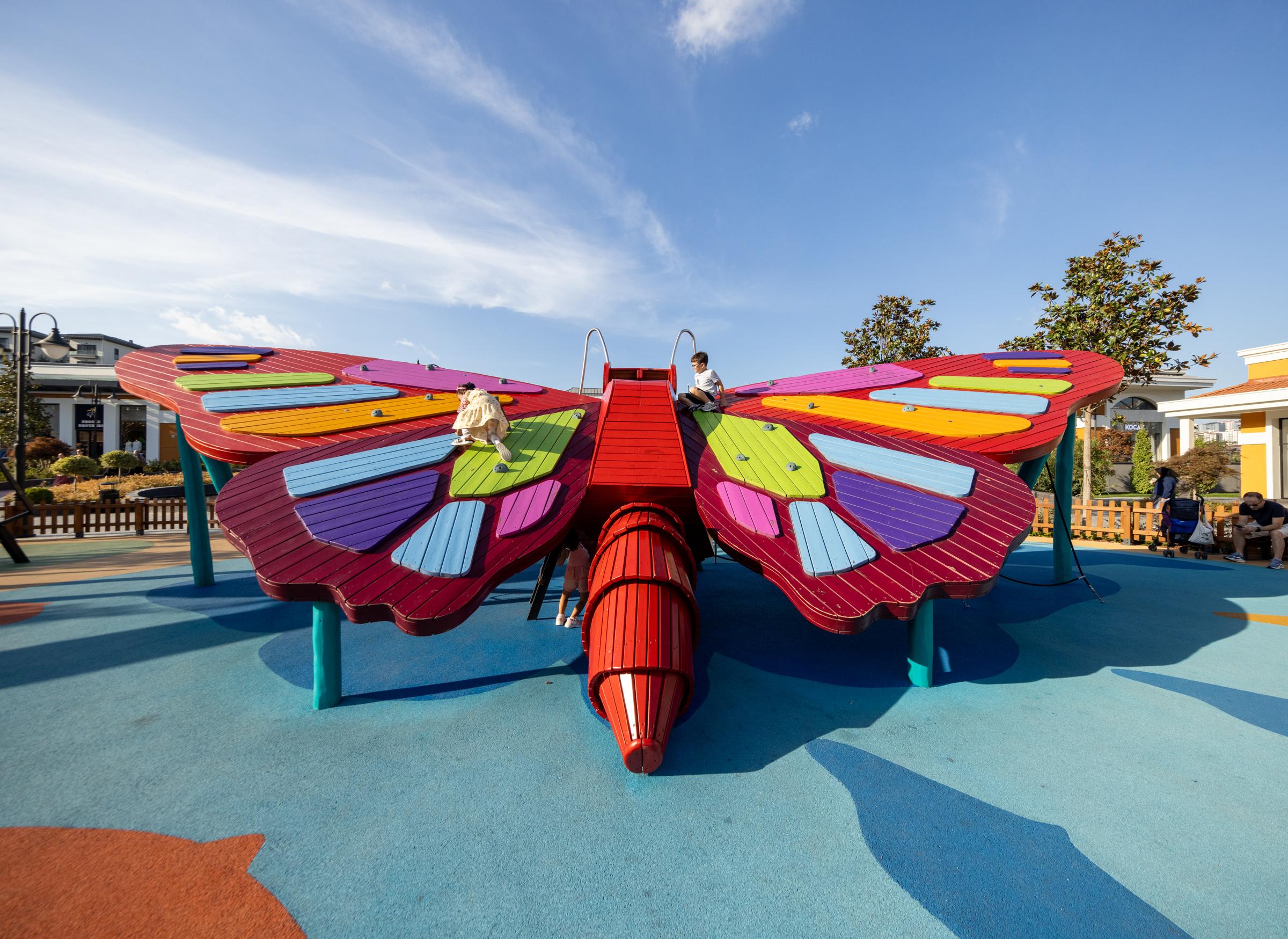 Wide view of butterfly play structure