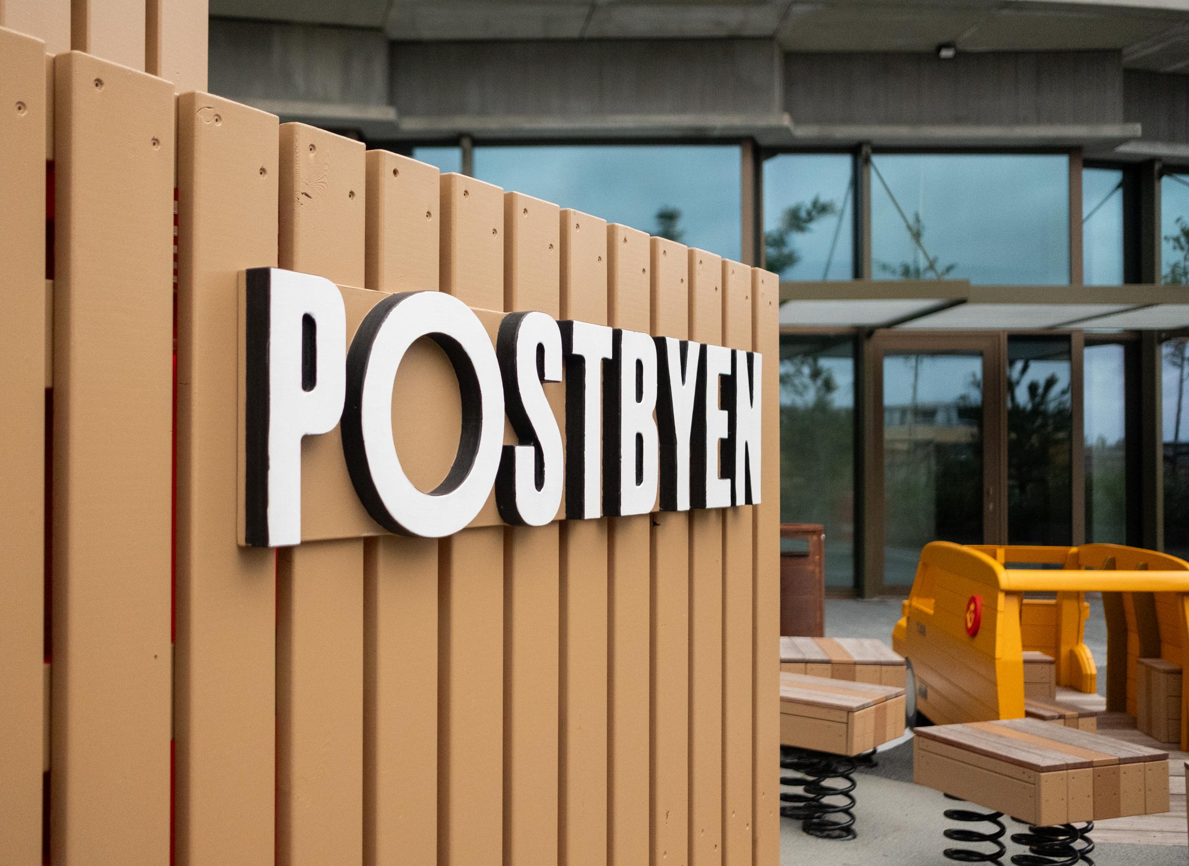 Postbyen logo sign at playground