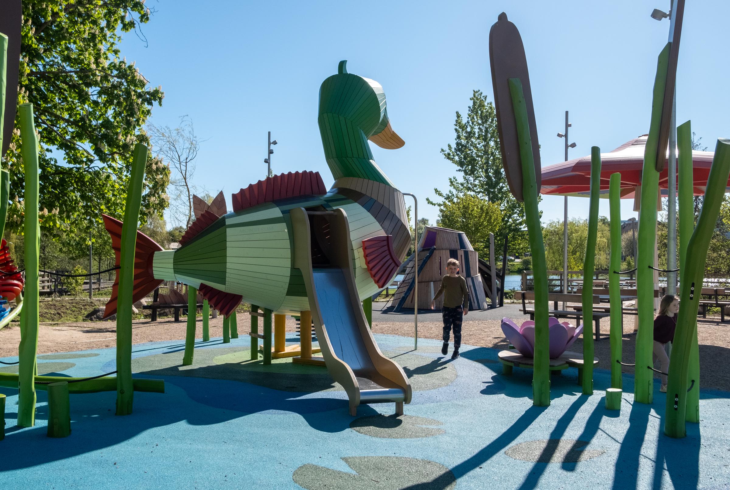 Wide view of duck-fish themed playground 