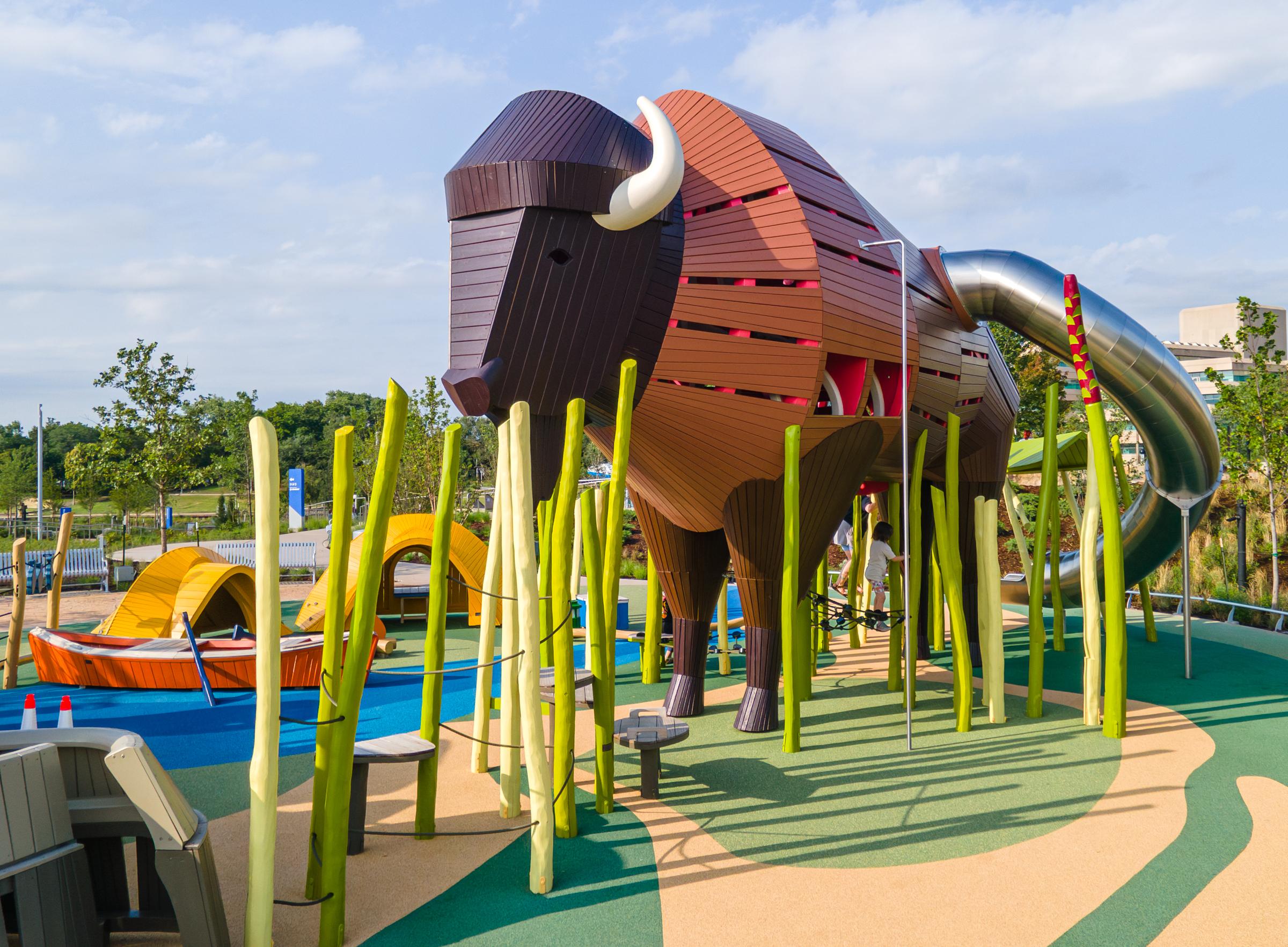 Bison and camp themed wooden playground