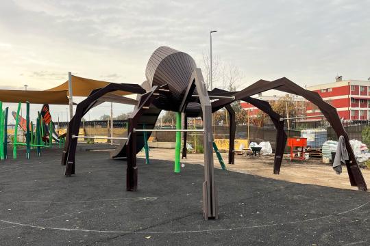 Huge wooden spider playground structure