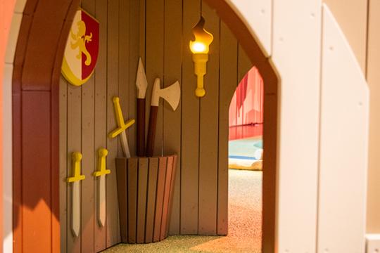 Wooden details on inside of playground castle
