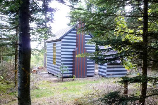 wooden cabin in forest