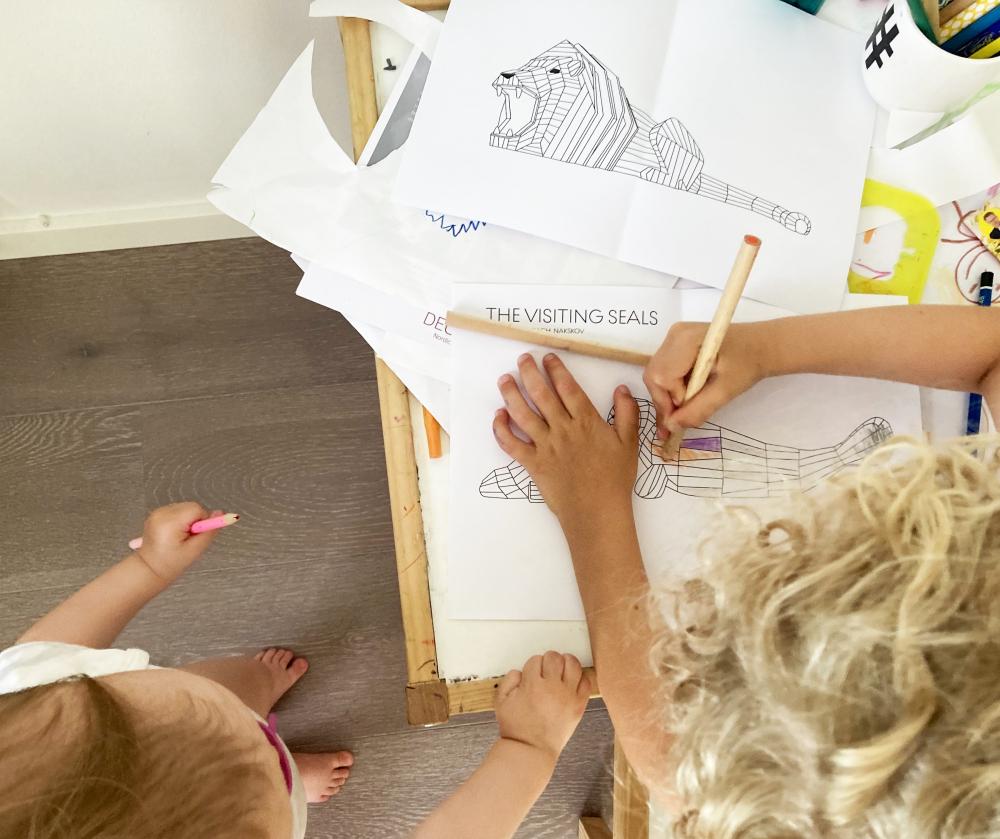 Kids colouring in MONSTRUM playgrounds