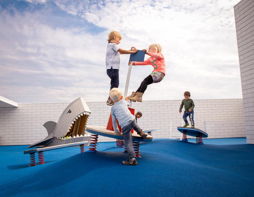 MONSTRUM playgrounds LEGO house shark and surfing boards