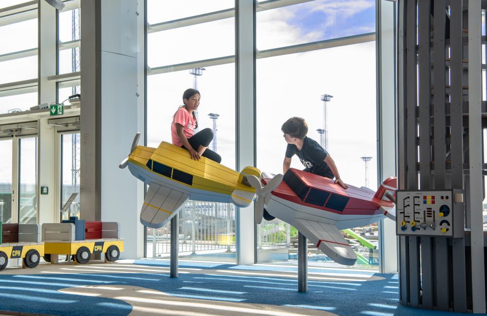 Kids playing on indoor playground at Copenhagen airport