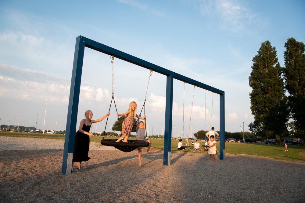 Children playing on swings, MONSTRUM