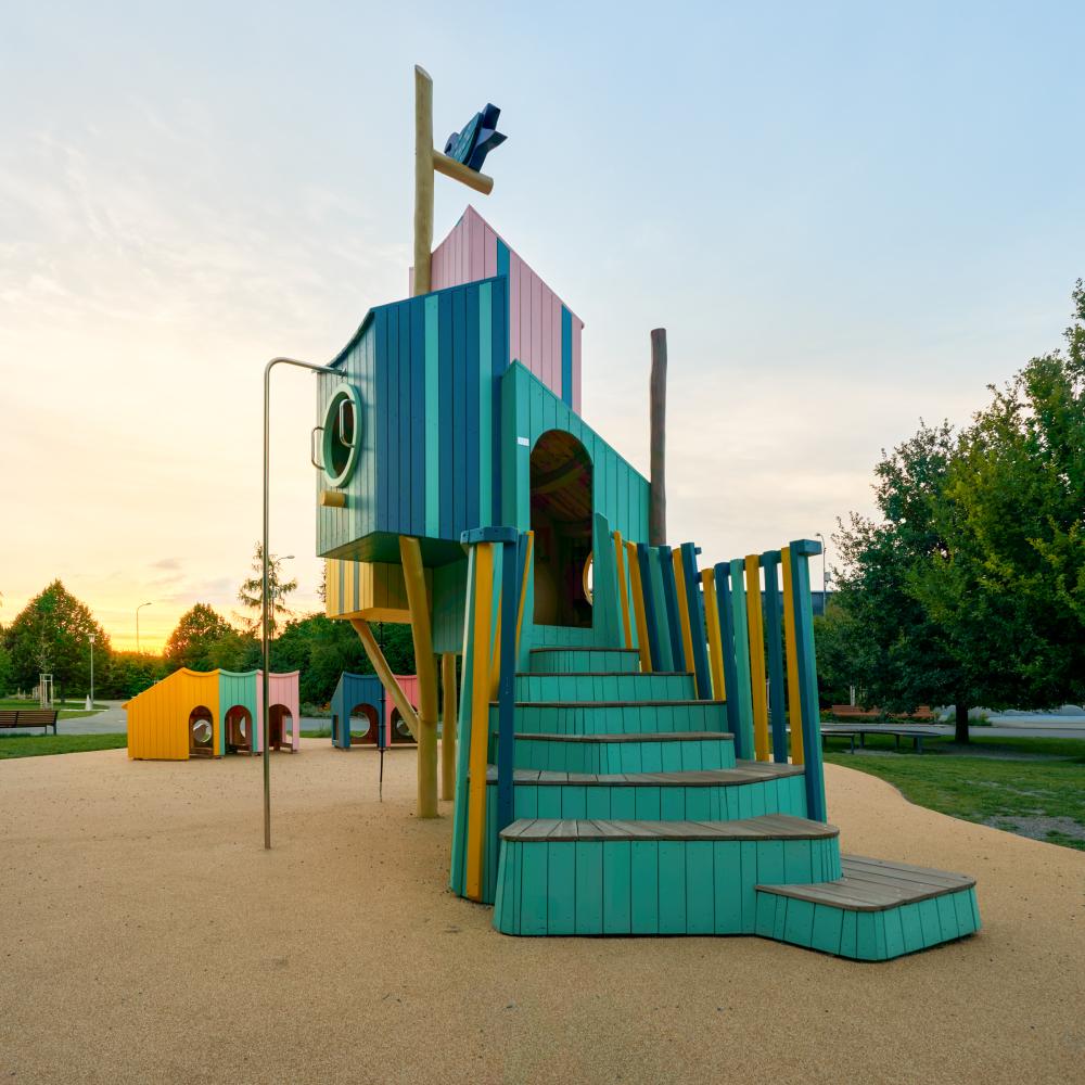 Wooden birdhouses playground with accessible staircase