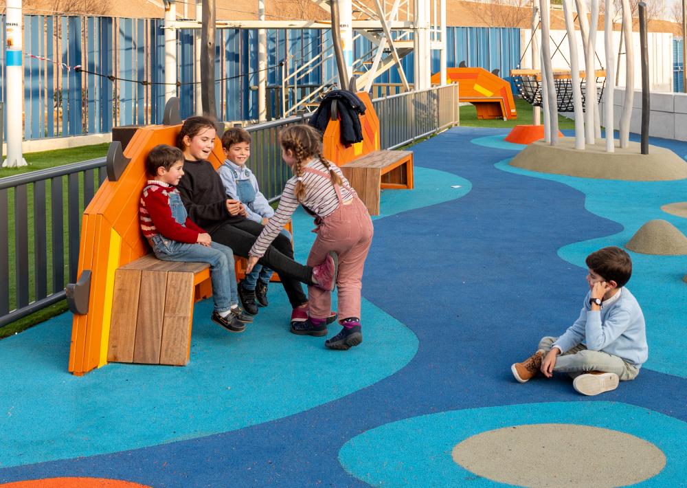Dragon tail-shaped bench at themed playground