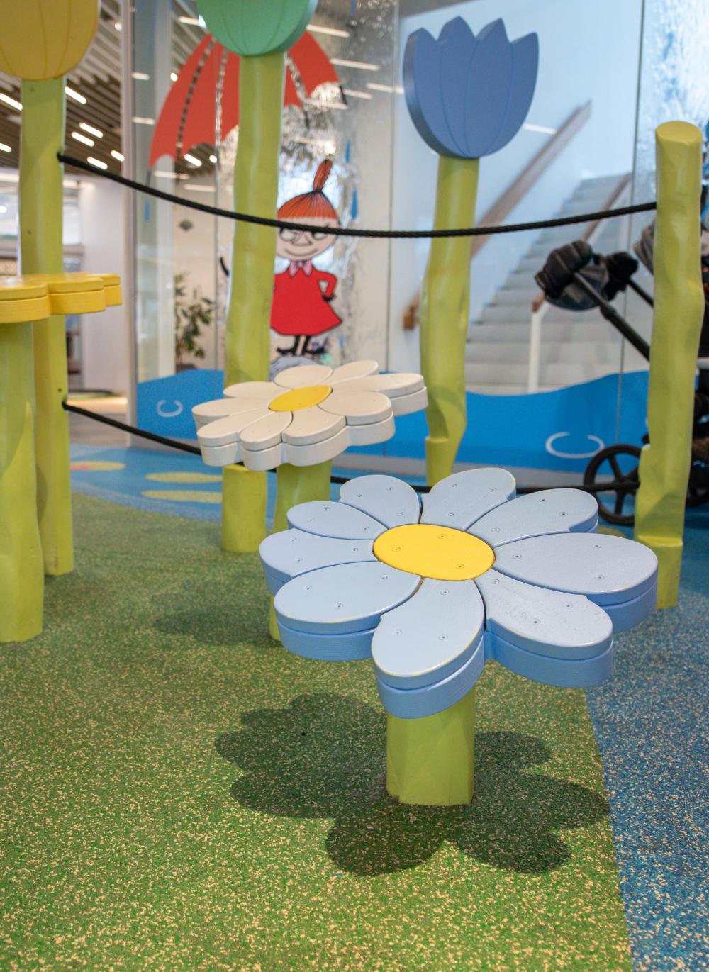 Wooden flowers at playground